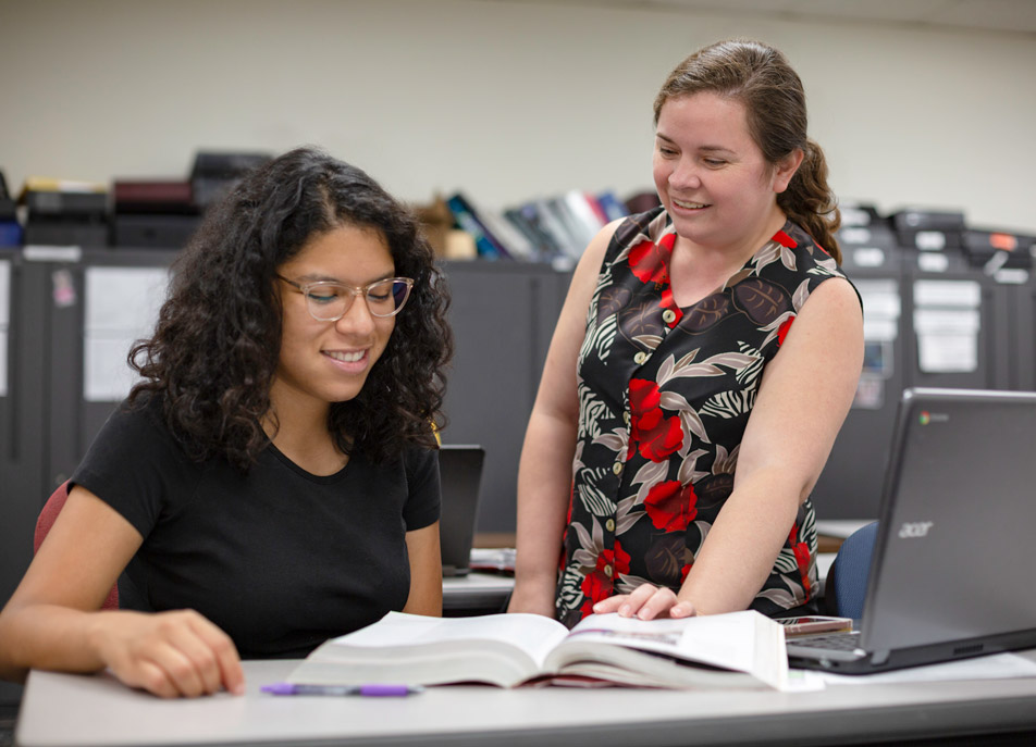 Academic Bridge program mentor tutoring a student
